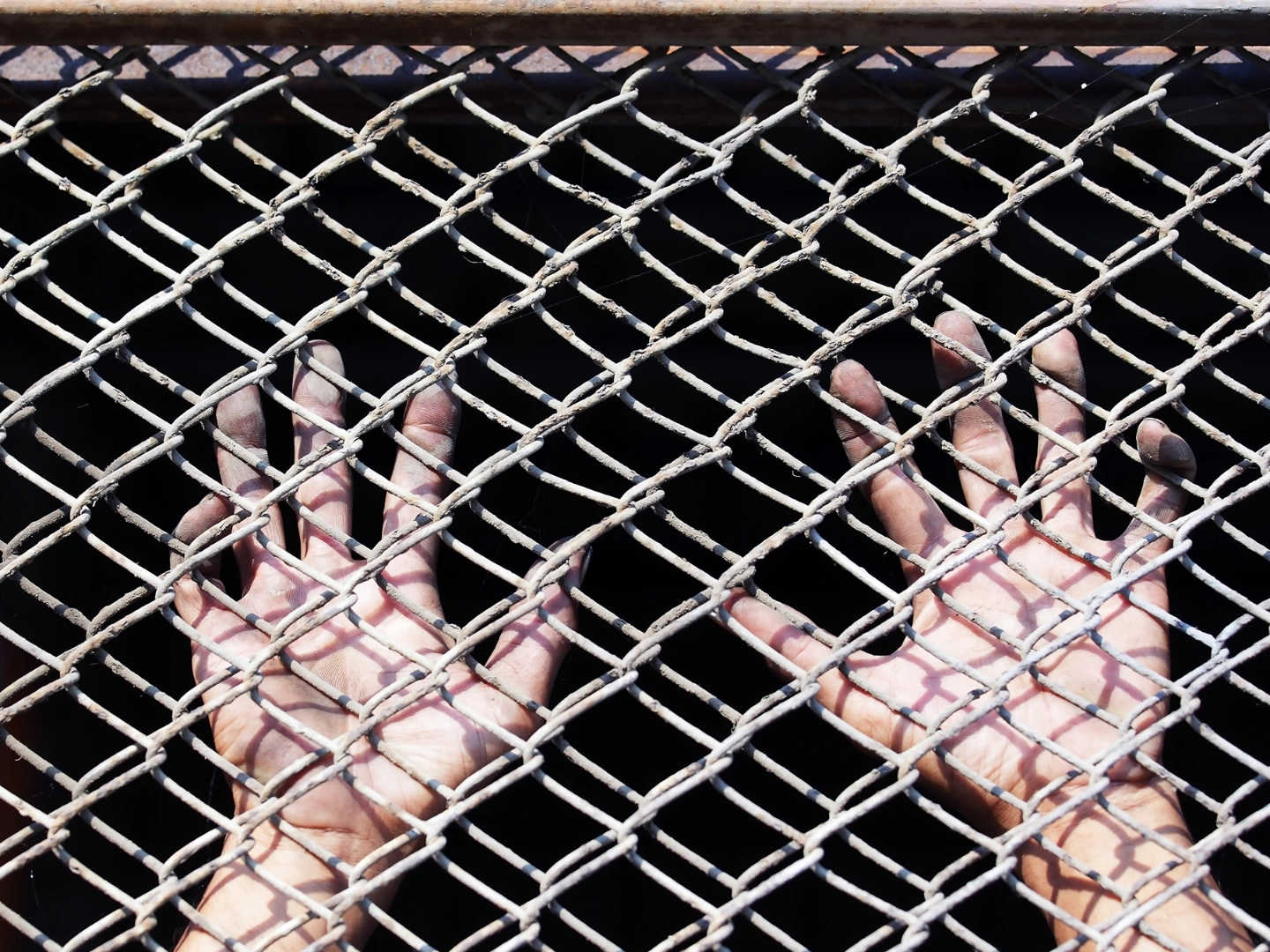 Gefangener hinter Gittern